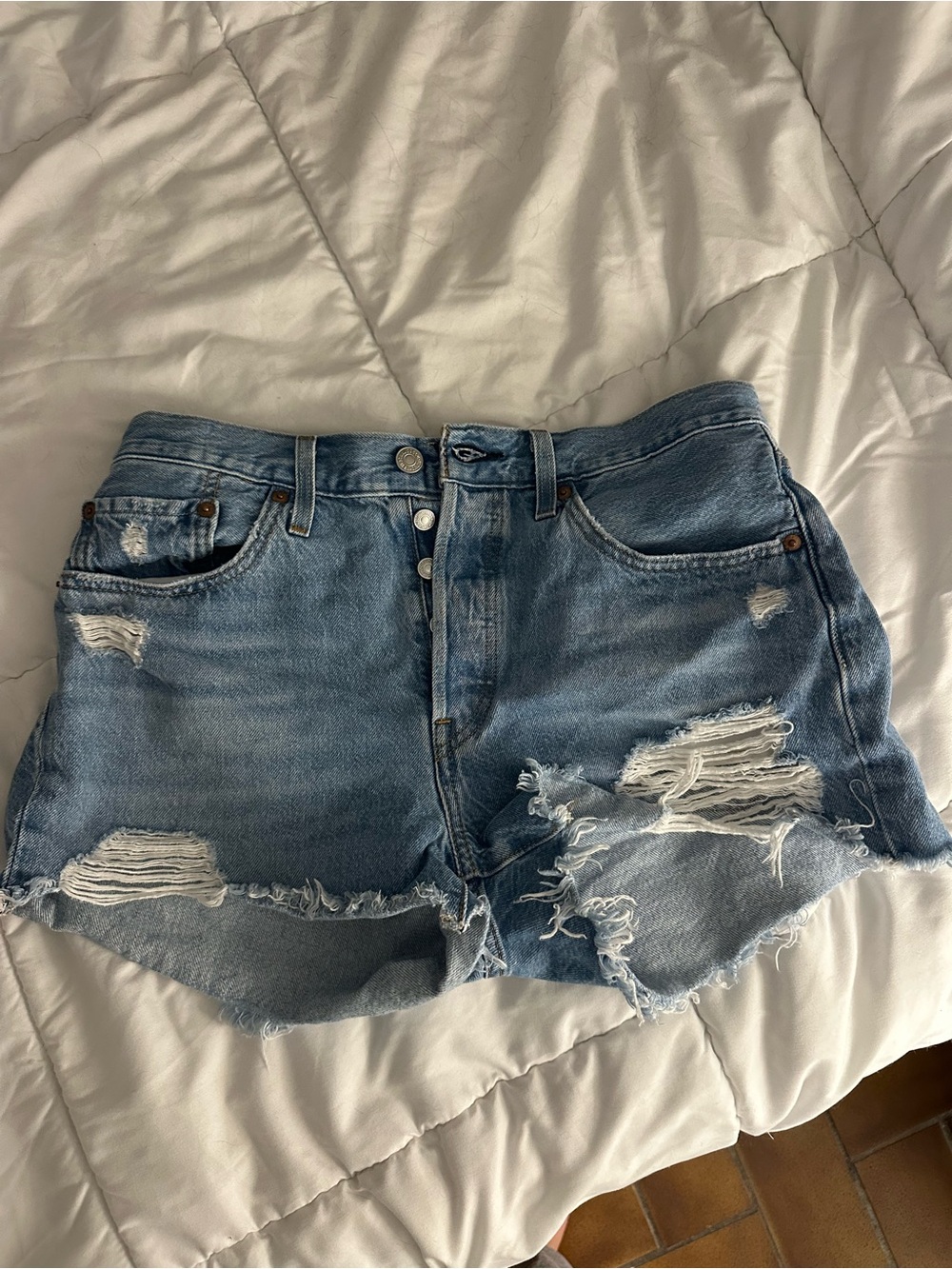 Levi's Light Blue Distressed Denim Cutoff 501 shorts